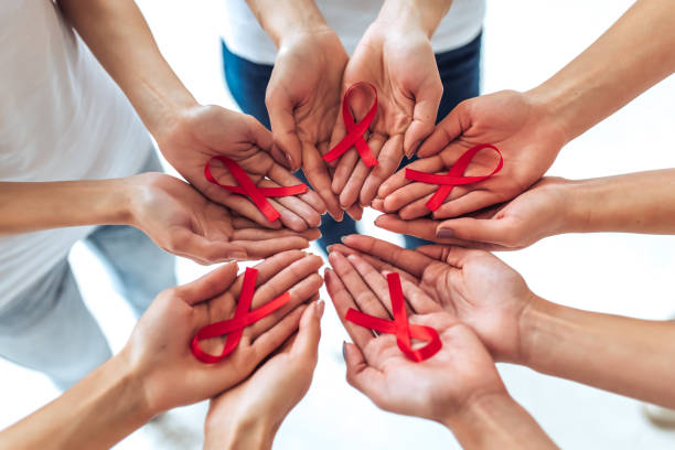 Healthcare professionals supporting HIV treatment adherence